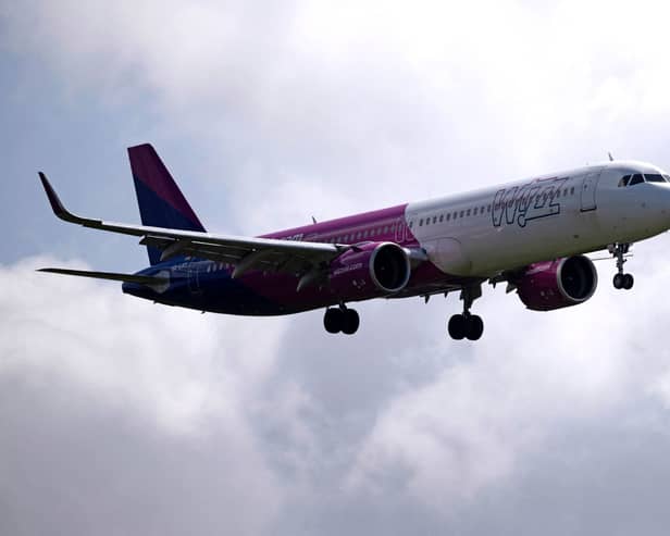 A Wizz Air jet comes in to land at Gatwick Airport. The airline will train 1,200 new pilots by 2028, including 240 based in the UK (Photo: BEN STANSALL/AFP via Getty Images)