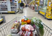 Food items in a shopping trolley inside a Tesco supermarket store. The retailer is hiring over 28,500 temporary staff across the UK for the Christmas period (Photo: DANIEL LEAL/AFP via Getty Images)