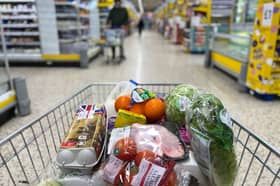Food items in a shopping trolley inside a Tesco supermarket store. The retailer is hiring over 28,500 temporary staff across the UK for the Christmas period (Photo: DANIEL LEAL/AFP via Getty Images)
