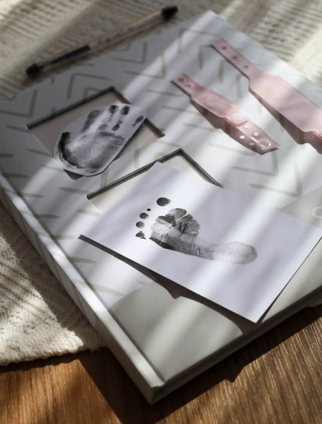 Within just twelve weeks, the once-clear newborn handprint had already begun to blur.