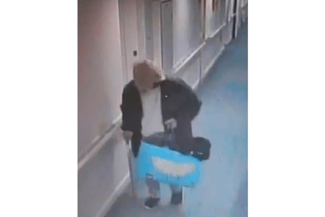 Eric is believed to be wearing a black coat, black tracksuit bottoms, and uses a silver walking stick.