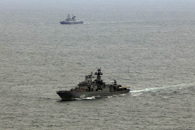 Admiral Kulakov in the foreground with HMS Duncan tracking a short distance away