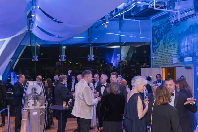 Guests enjoy the champagne reception at the Spinnaker Tower's 20th birthday celebration