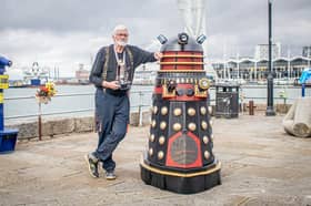 Portsmouth inventor Lee Adams with the music-playing Dalek he built.