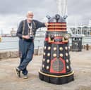 Portsmouth inventor Lee Adams with the music-playing Dalek he built.
