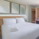 Travelodge rooms under the £35 deal include standard double en-suites like this one, with availability across the UK