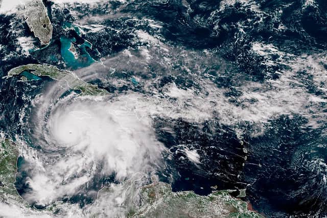 Hurricane Melissa pictured by satellite as it churned northwest through the Caribbean Sea on Monday evening