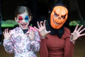 Cousins Esme Beaton, 5, and Mia Connet, 14, help bring the spooky to Spookesbury.
