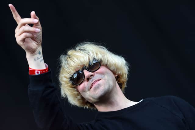 Tim Burgess from The Charlatans performs on Day 2 of the V Festival at Hylands Park on August 23, 2015 in Chelmsford, England.
