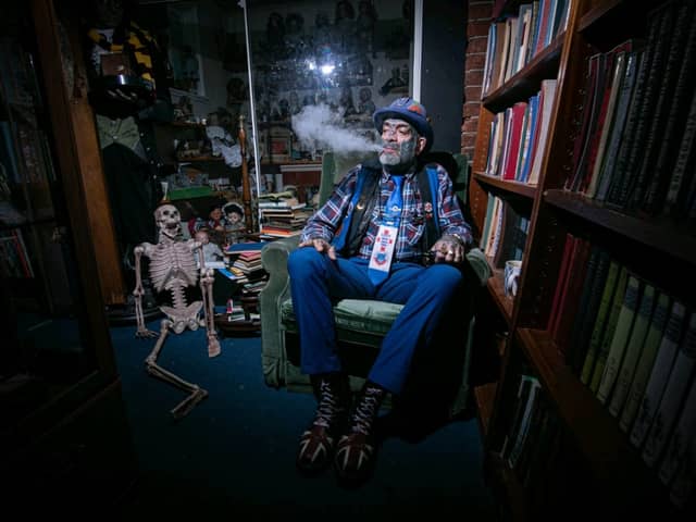 Pompey fanatic John Portsmouth Football Club Westwood who owns the Petersfield Bookshop pictured during Halloween 2024.