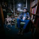 Pompey fanatic John Portsmouth Football Club Westwood who owns the Petersfield Bookshop pictured during Halloween 2024.
