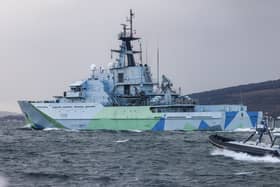 Chilling scenes have seen a Royal Navy warship swarmed by drone boats.