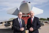The government is announcing a defence housing strategy amid a £9bn overhaul for armed forces accommodation. Pictured: Prime minister Sir Keir Starmer and defence secretary John Healey.