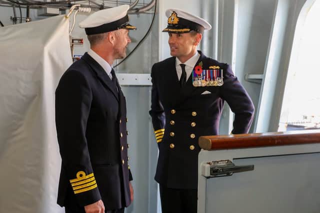 Captain Wil Blackett with his successor, Captain Ben Power.