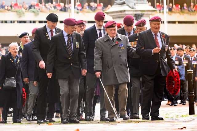 Veterans march towards the Cenotaph.