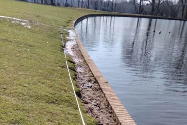 A puddle against the lake wall at Staunton County Park