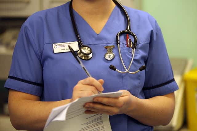 A nurse in the accident and emergency dept of Selly Oak Hospital in Birmingham. Around 18,000 staff roles are being cut in England as part of a major reorganisation (Photo: Christopher Furlong/Getty Images)
