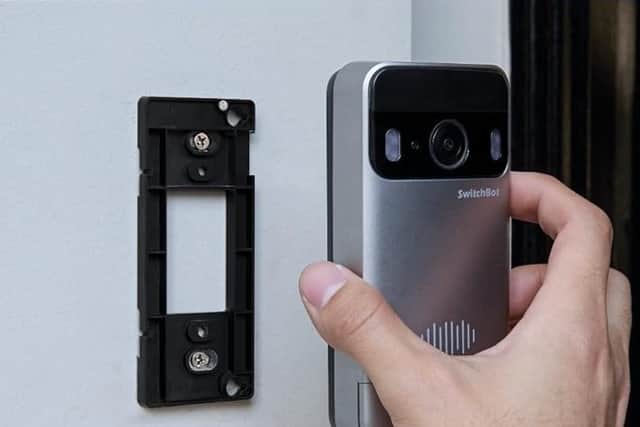 The doorbell can be screwed to your wall or, cleverly, can be stuck on to a flat surface with double-sided tape