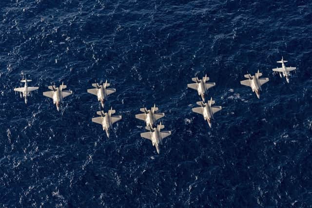 A batch of F-35Bs being procured for the Royal Navy and RAF has been delayed. Pictured: Italian and British F-35B Jets and Italian Navy AV-8B Harrier II Jets fly over UK Flagship, HMS Prince of Wales and Italian aircraft carrier, ITS Cavour, after conducting Exercise Neptune Strike.