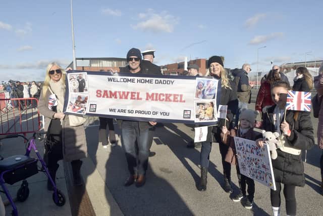 Pictured is: (l-r) Kim Cook, Kevan Cook, Christina McRae, George Cook (5) and Alice Tomlinson (10) waiting for Kim's son Sam Cook (36) from Southampton, who has served as a marine engineer for four years.