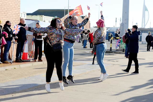 Excited spectators waiting for their loved ones to step ashore from HMS Prince of Wales.