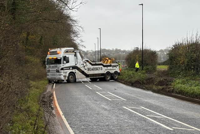 A TJ Transport vehicle is being towed out of a field after leaving Wickham Road and ploughing into the field.
Picture: Sarah Standing