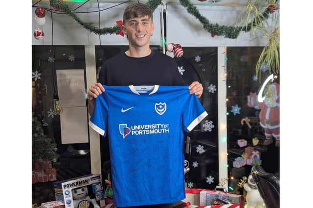 Pompey FC's Hayden Mathews has teamed up with The Barbers, in Old Portsmouth, to support its annual toy drive this Christmas.