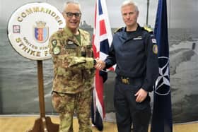 Rear Admiral Mark Anderson alongside Nato 's ARF Commander General Carai. British Royal Navy personnel will be taking charge of a Nato task force soon.