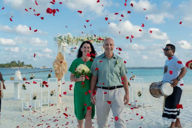 Flower girls showered us with rose petals as we walked hand-in-hand following the ceremony.