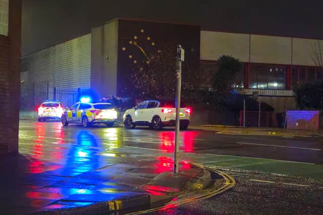 Police stop car on Arundel Street