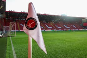 A Charlton Athletic supporter has died after a medical emergency at The Valley against Pompey.