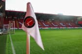 A Charlton Athletic supporter has died after a medical emergency at The Valley against Pompey.