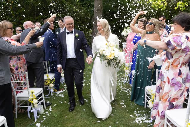 The Prime Minister Anthony Albanese and Jodie Haydon walk down the aisle after getting married today in Canberra. Photograph by Mike Bowers