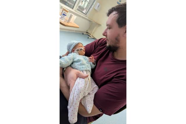 Danny Cussen with his son George at Southampton General Hospital.
