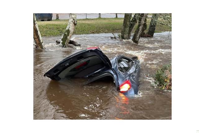 The car after it was swept away 50 metres downstream
