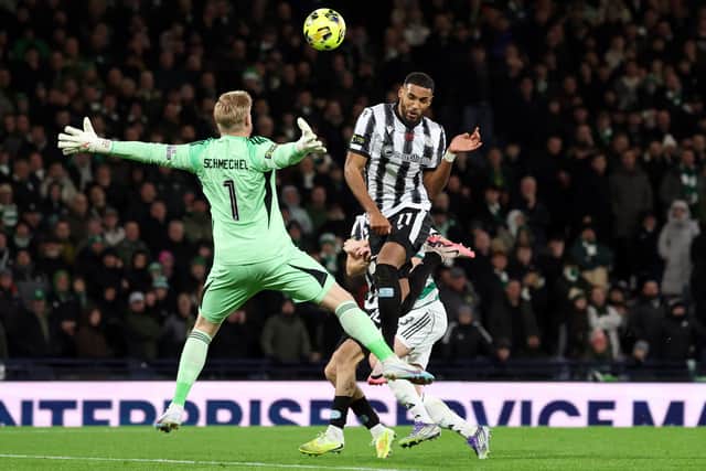 St Mirren striker Jonah Ayunga leaps unchallenged to head over Celtic goalkeeper Kasper Schmeichel