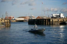 A Royal Navy Rattler boat sailing by itself at HMNB Portsmouth. They have already been used extensively on trials.