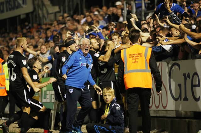 Barry Harris celebrates Ronan Curtis' goal at Bristol Rovers in August 2018. Picture: Joe Pepler