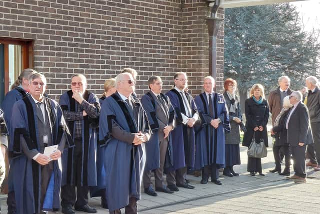 Councillors wearing their gowns at Portchester Crematorium for the funeral of Gosport councillor Bob Maynard