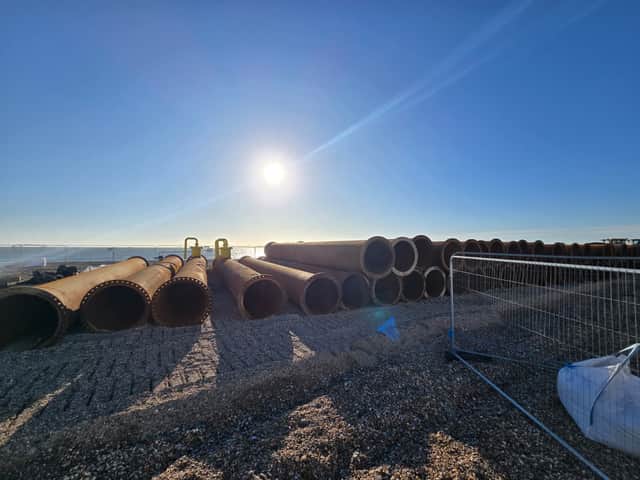 Giant pipes used to import shingle are dismantled in Southsea