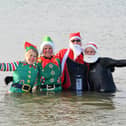 Dozens of people took part in the Boxing Day Dip at Lee-on-the-Solent raising money for Harbour Cancer Support.