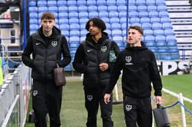 Harvey Blair, centre, alongside Pompey team-mates Hayden Matthews and Adrian Segecic ahead of today's game against QPR
