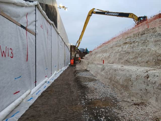 Backfilling begins next to the new underpass at Junction 10 of the M27