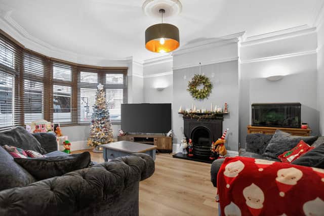 The property features a welcoming lounge and a separate dining room