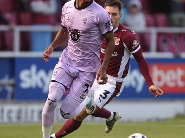 Former Pompey man Reeco Hackett is in excellent form for Lincoln City. Pic: Getty.