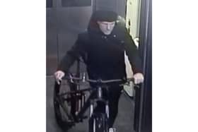 Police have released the image of a man they would like to speak to after £40,000 worth of belongings was taken from a property in Petersfield.