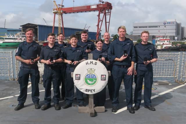 HMS Spey sailors receiving Wider Service Medals.