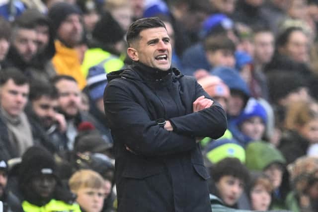 Pompey boss John Mousinho in the 4-1 defeat to Arsenal. Picture: Graham Hunt/ProSportsImages