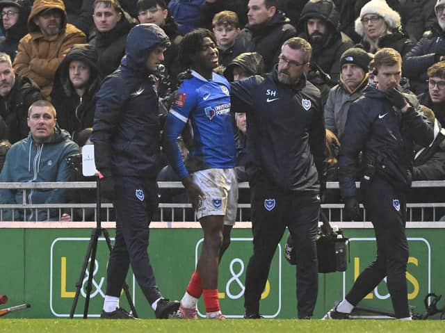 Franco Umeh was forced off in the 84th minute after seemingly tearing his hamstring against Arsenal. Picture: Graham Hunt/ProSporsImages