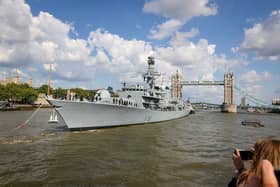 A sailor had to be evacuated from HMS Sutherland while she was docked in Plymouth Sound. Pictured: The ship passing Tower Bridge, London, earlier in 2025.
